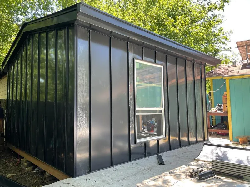 Black standing seam metal wall panels for Roof Inspection in Piney Green